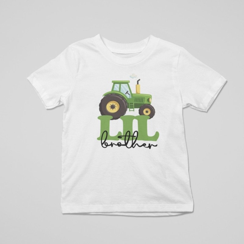 White t-shirt with green tractor graphic and 'little brother' text