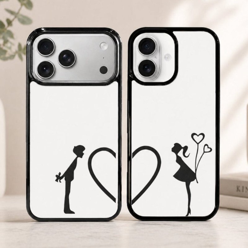 Two phone cases with black illustrations of a couple and heart shapes