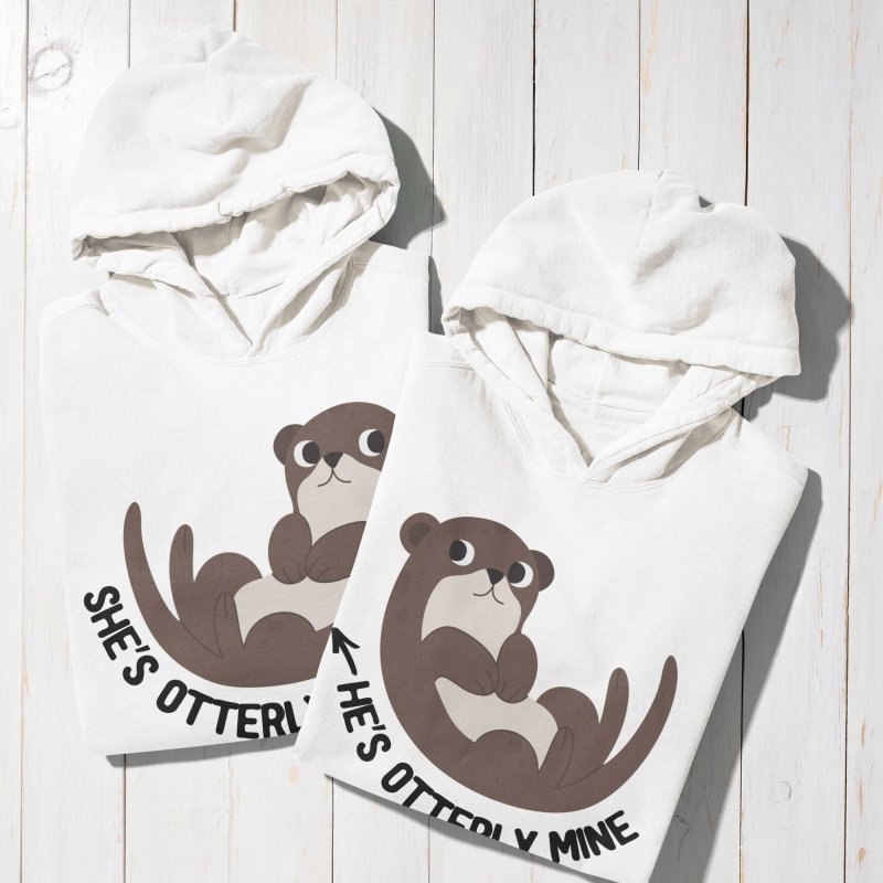 Matching otter hoodies